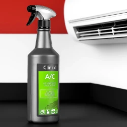 Butelka ze spryskiwaczem Clinex A/C, środka do czyszczenia i dezynfekcji klimatyzacji, stojąca obok jednostki klimatyzatora.